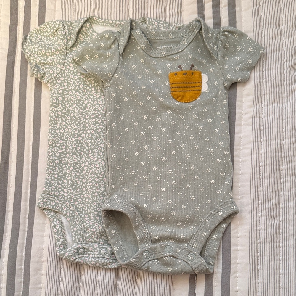 Carter's Green Baby Onesie set of 2, one with Bee Patch, one with flower pattern